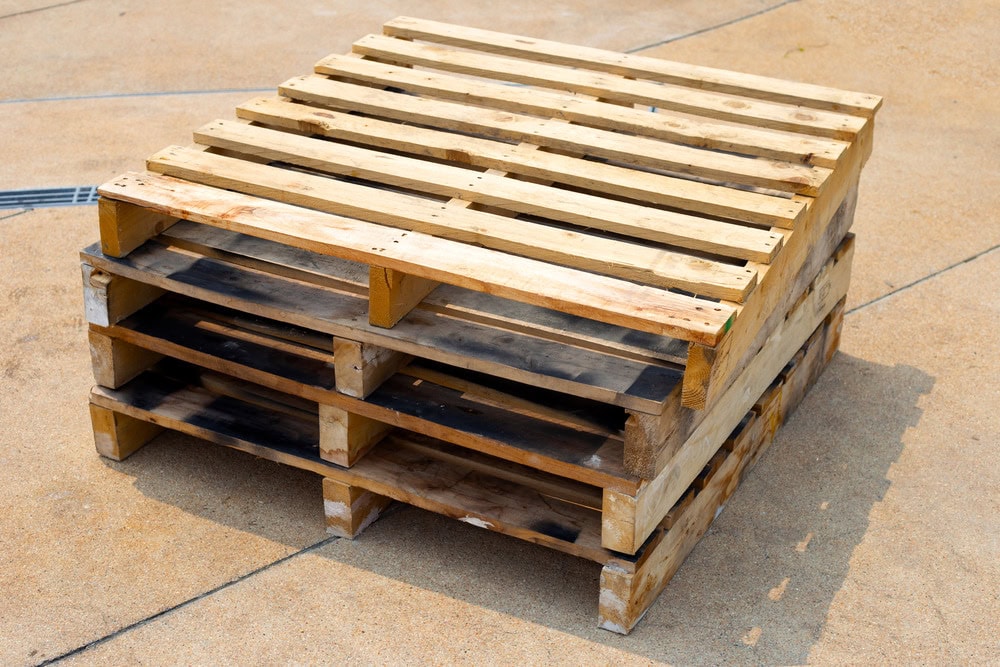 Wooden pallet designed for transporting chemical products safely across Europe